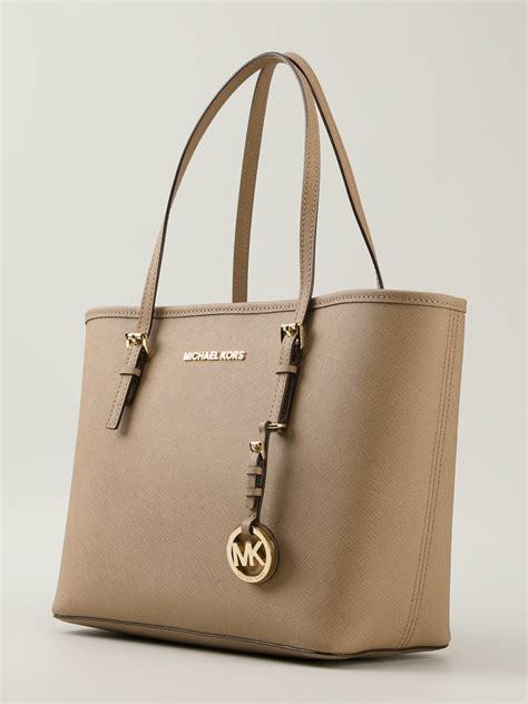 michael kors jet set travel dressy tote|Michael Kors airplane print.